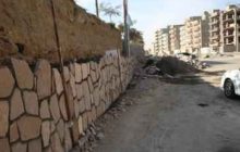 تداوم عملیات عمرانی احداث دیوار سنگی در خیابان سوسنگرد 