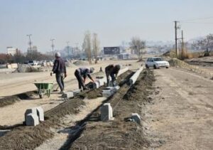 تداوم عملیات آماده سازی اراضی 59 هکتاری میدان تیر با زیرسازی معابر اصلی وفرعی