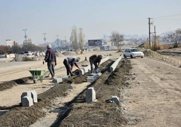 تداوم عملیات آماده سازی اراضی 59 هکتاری میدان تیر با زیرسازی معابر اصلی وفرعی